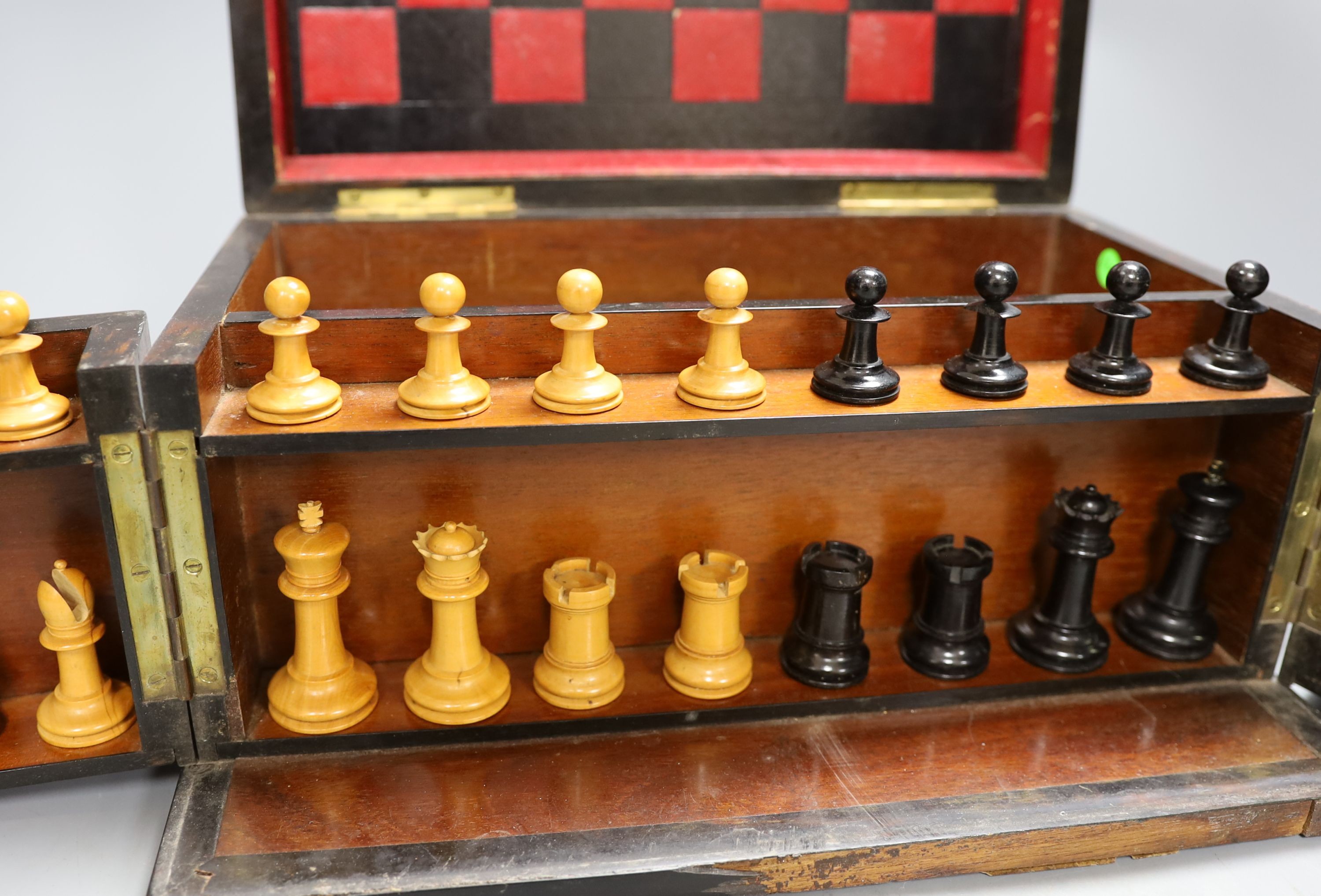 A Victorian burr walnut games compendium, 33cm wide